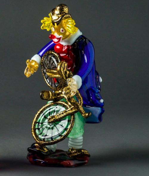 Clown with bicycle